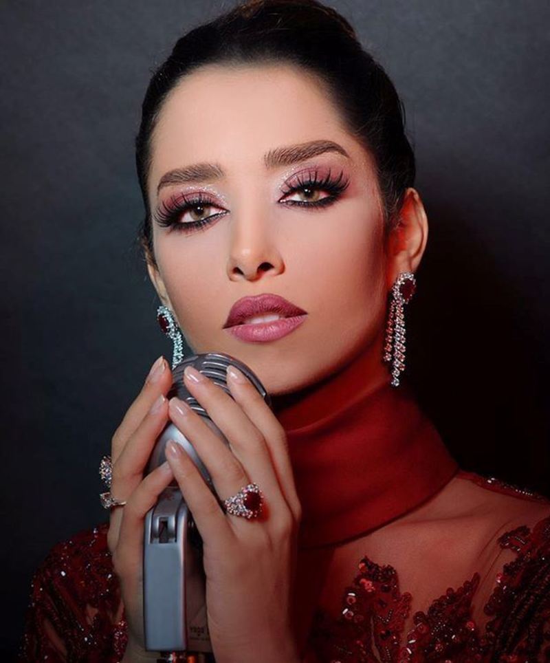 صور بلقيس فتحي بفستان أحمر من توقيع إيلي صعب ومجوهرات مرصعة بالياقوت والماس